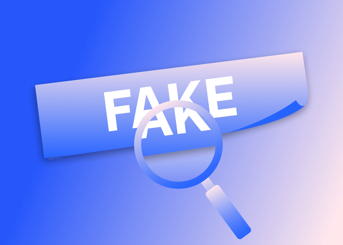 A magnifying glass hovers over a blue banner with the word "FAKE" written on it in white capital letters.
